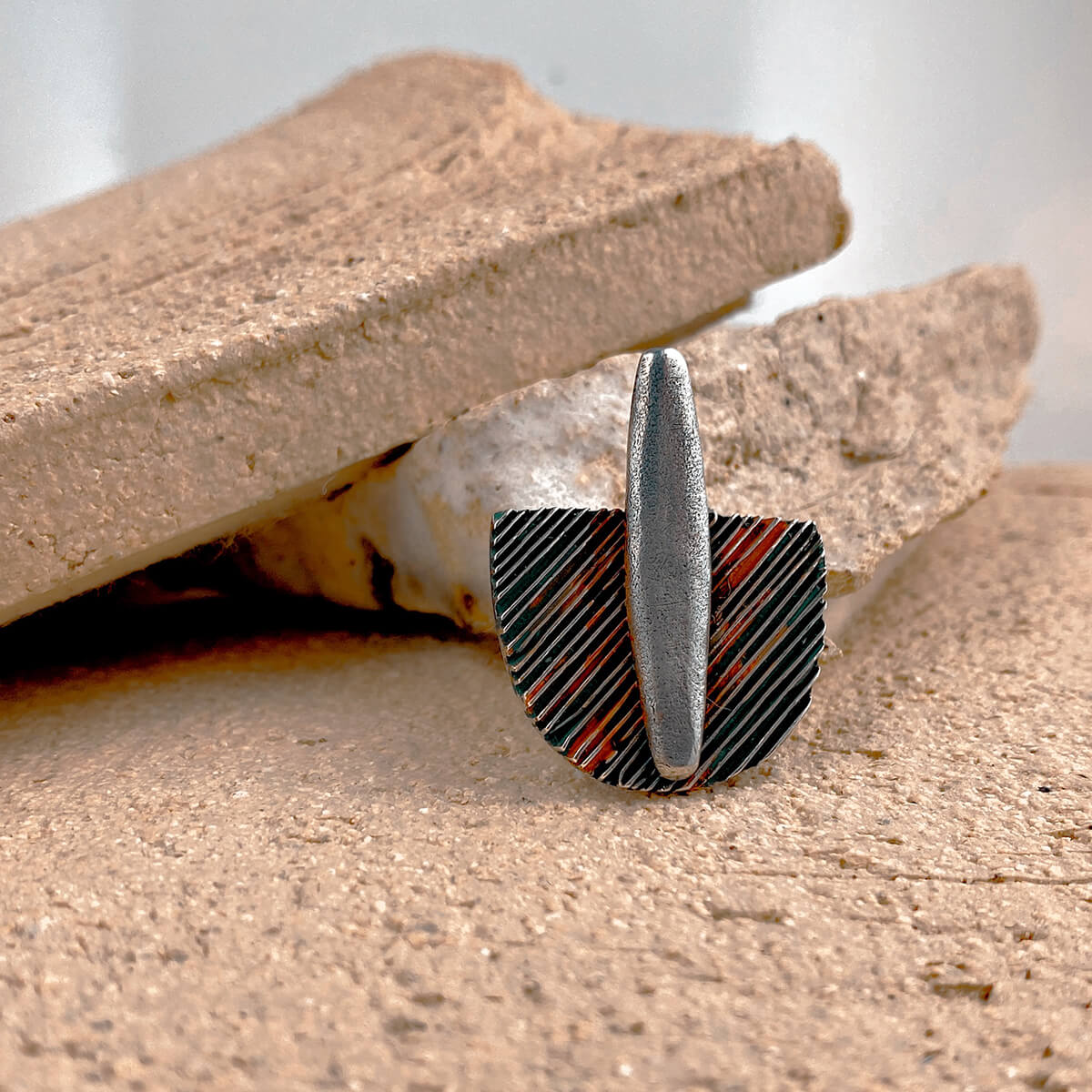 penjoll de plata i color